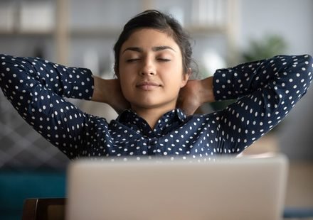 A girl relaxing from screen with closed eyes